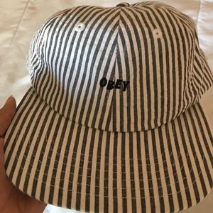 Gray and white striped obey hat